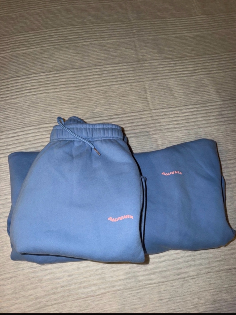 Women’s Light Blue Track Joggers with Pink Logo